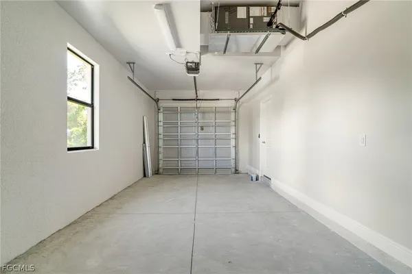 a bathroom with a granite countertop toilet a sink and shower