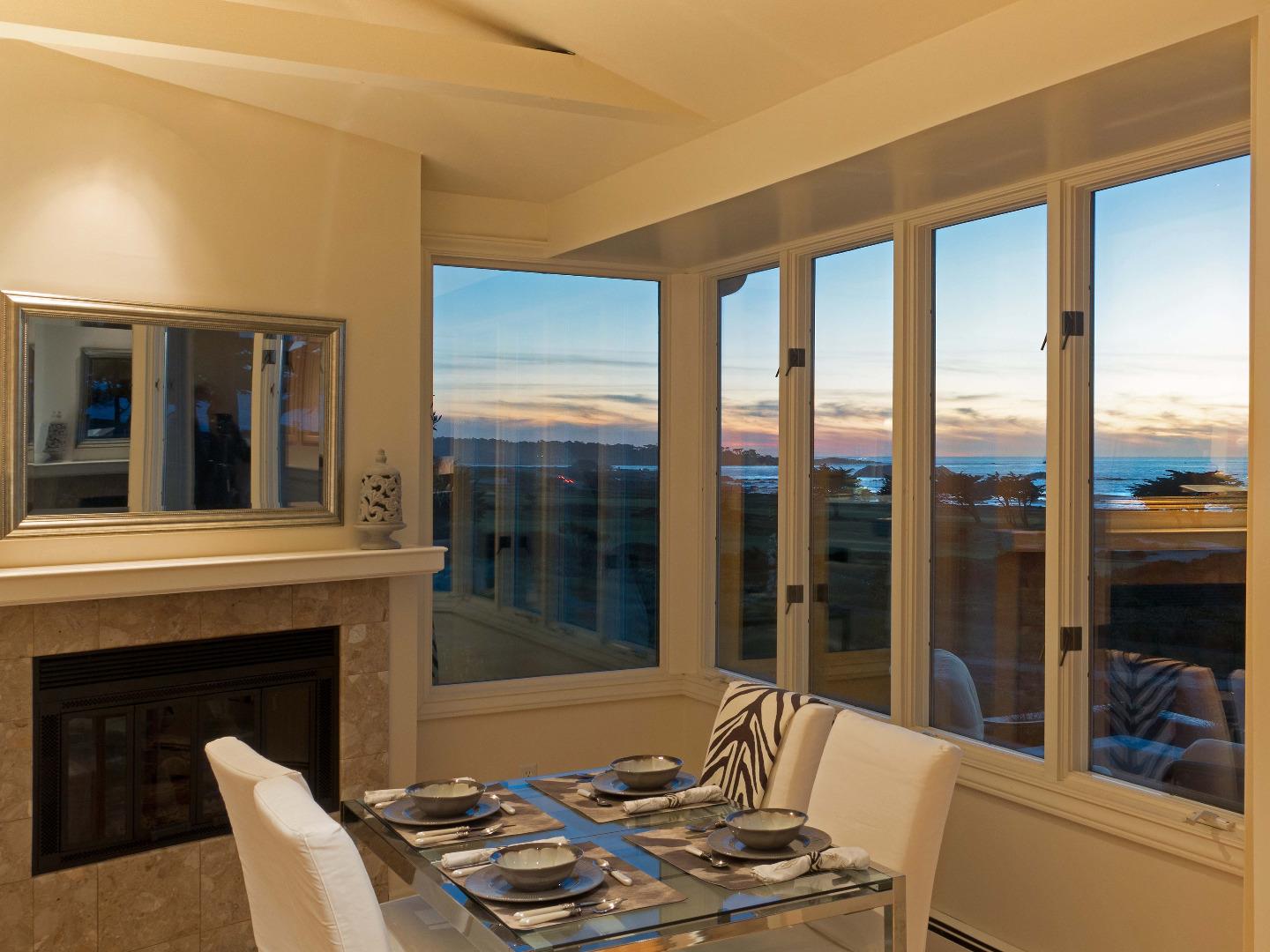 1000 Rodeo Road Pebble Beach, CA 93953 - Photo 16 of 28 a living room with furniture and a fireplace