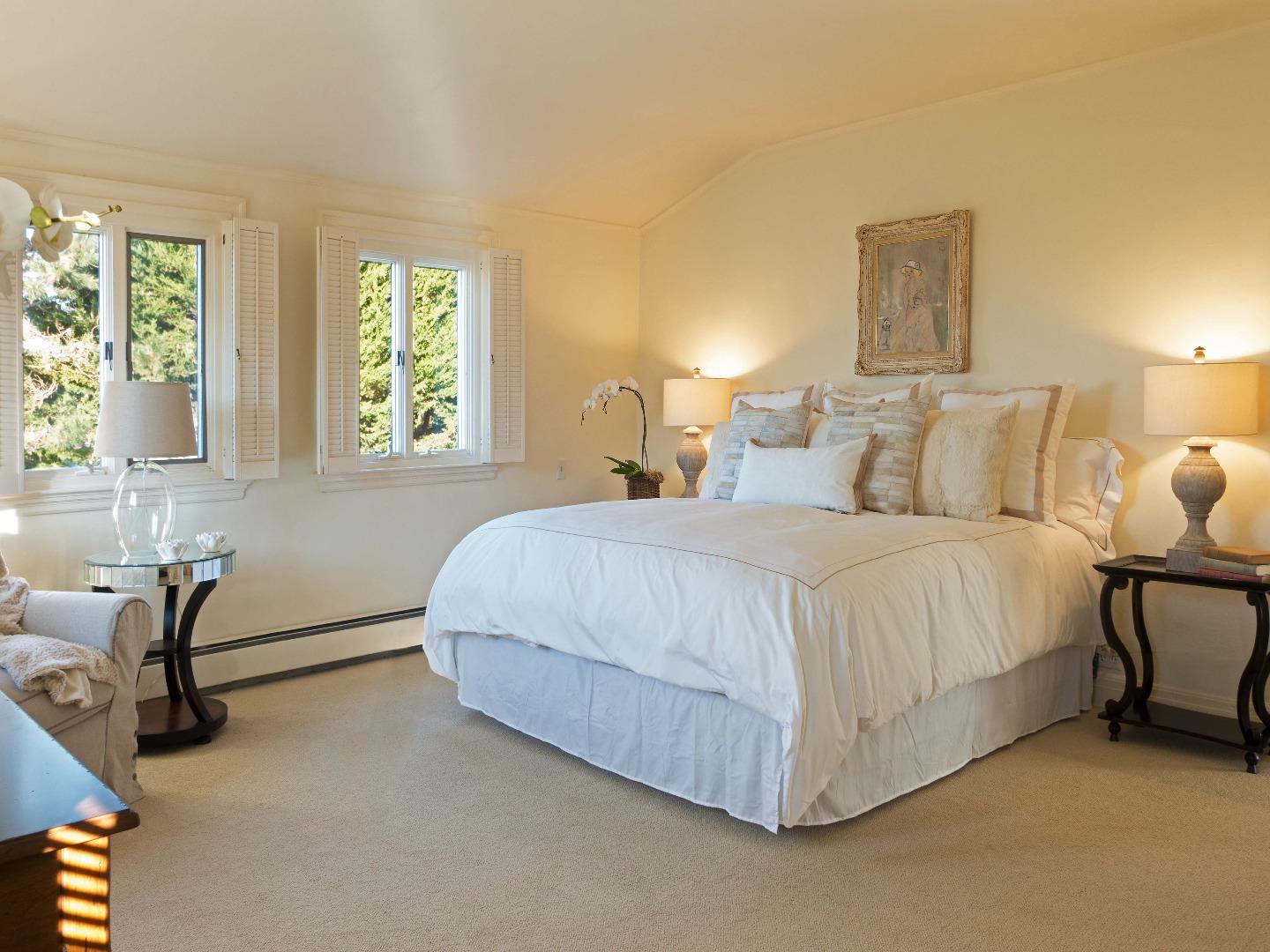 1000 Rodeo Road Pebble Beach, CA 93953 - Photo 17 of 28 a bed room with a bed and a table