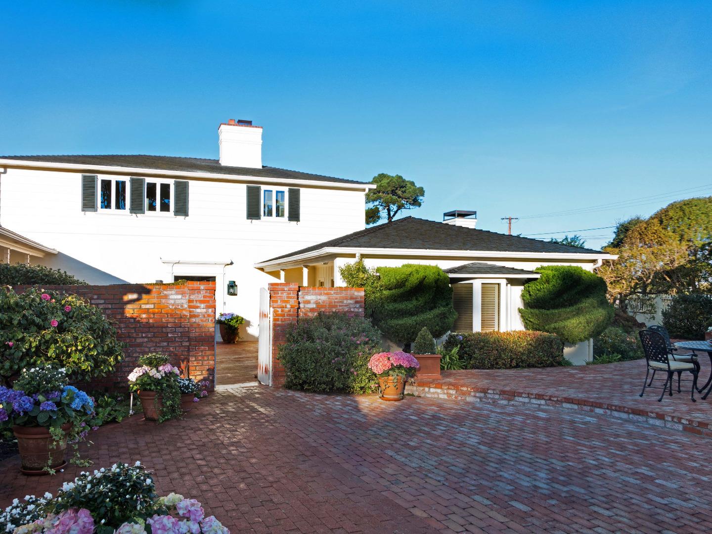 1000 Rodeo Road Pebble Beach, CA 93953 - Photo 27 of 28 a front view of a house with garden