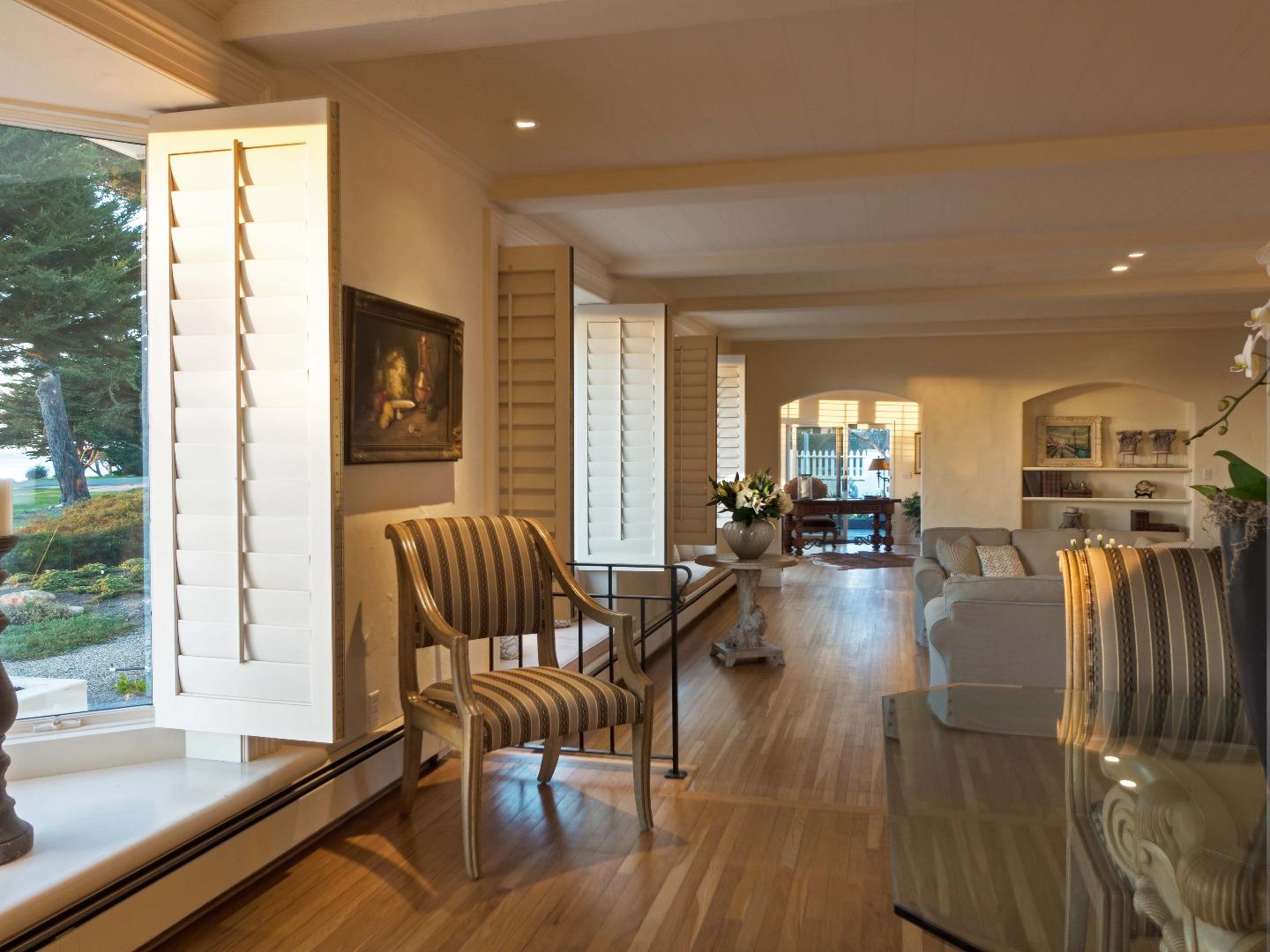 1000 Rodeo Road Pebble Beach, CA 93953 - Photo 7 of 28 a living room with furniture and a flat screen tv