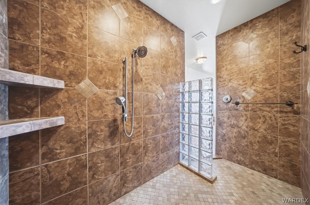 1084 Dike Road Mohave Valley, AZ 86440 - Photo 63 of 75 a bathroom with a shower