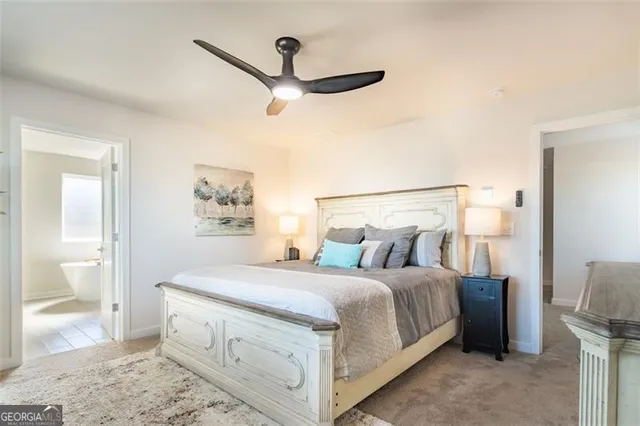 a bedroom with a bed and a walk in closet