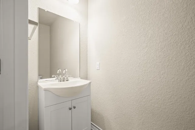 a bathroom with a sink a toilet and a bathtub