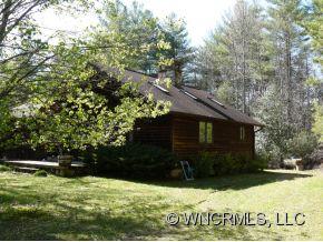 764 Oscar Chappell Road Brevard, NC 28712 - Photo 3 of 21 a view of house with a yard