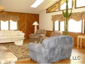 764 Oscar Chappell Road Brevard, NC 28712 - Photo 4 of 21 a living room with furniture and a window