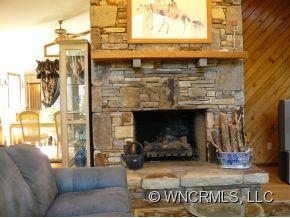 764 Oscar Chappell Road Brevard, NC 28712 - Photo 5 of 21 a view of a living room filled with furniture