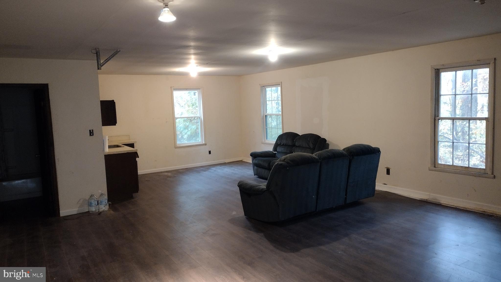 Aspen Hill Road Mineral, VA 23117 - Photo 5 of 8 a living room with furniture and a window