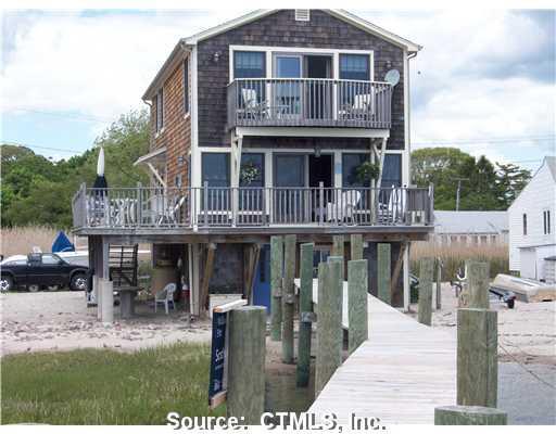 65 Pine Island Road Groton, CT 06340 - Photo 1 of 1 a view of a house with roof deck