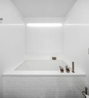 a bathroom with a bathtub