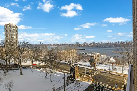 a view of a terrace with lake view and city view