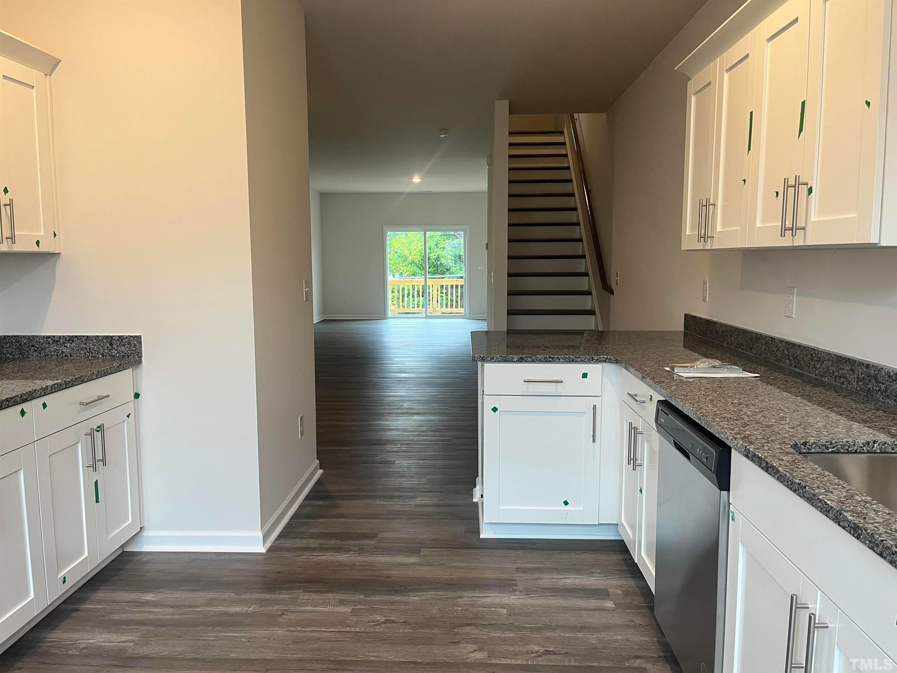 5018 Jayden Drive Durham, NC 27704 - Photo 10 of 22 a kitchen with a sink and a stove