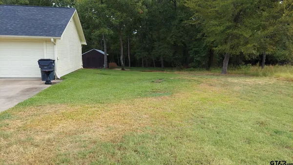 a view of outdoor space and yard