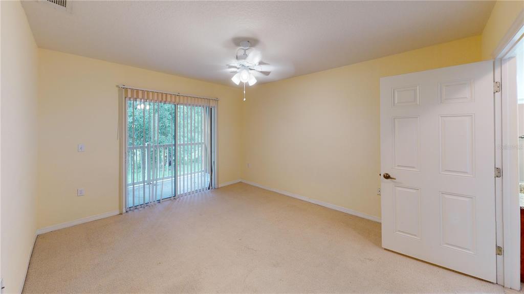 4600 East Moody Boulevard, Unit 5N Bunnell, FL 32110 - Photo 22 of 44 a view of an empty room with a window