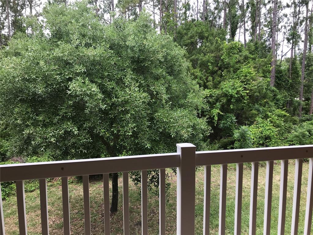 4600 East Moody Boulevard, Unit 5N Bunnell, FL 32110 - Photo 33 of 44 a view of a balcony with outdoor space