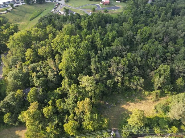 a view of a lake with a yard