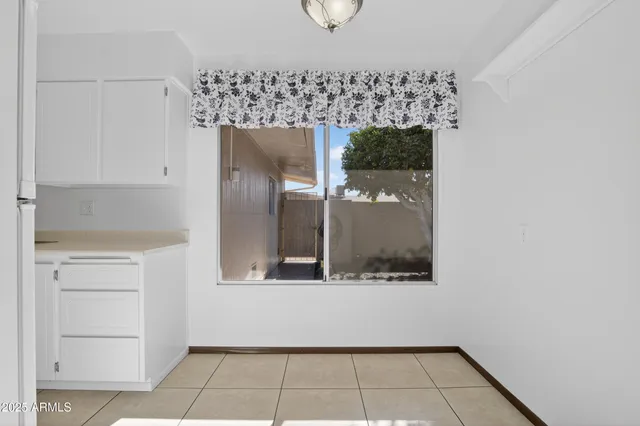 a kitchen with a refrigerator sink and stove