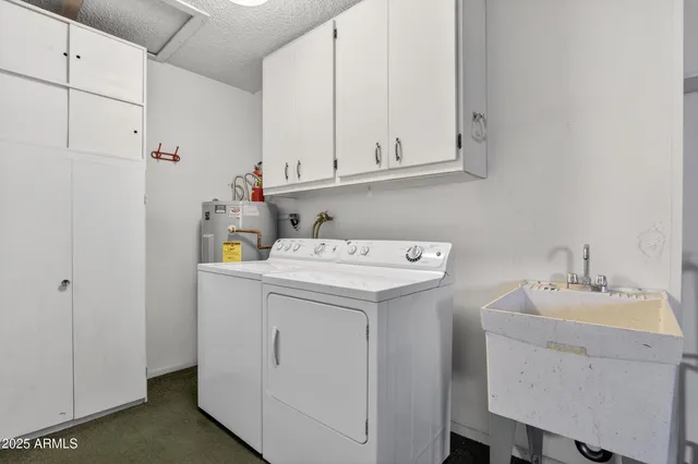 a bathroom with a toilet sink a mirror a bathtub and shower