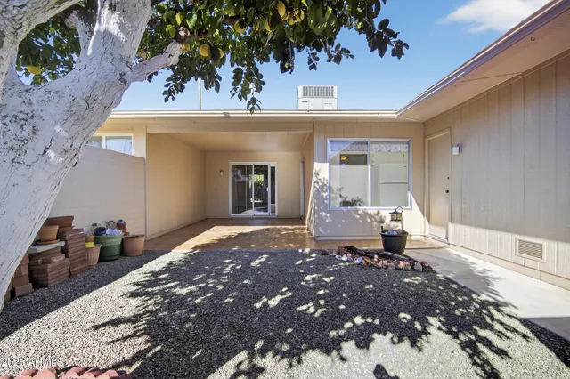 a view of a house with a patio