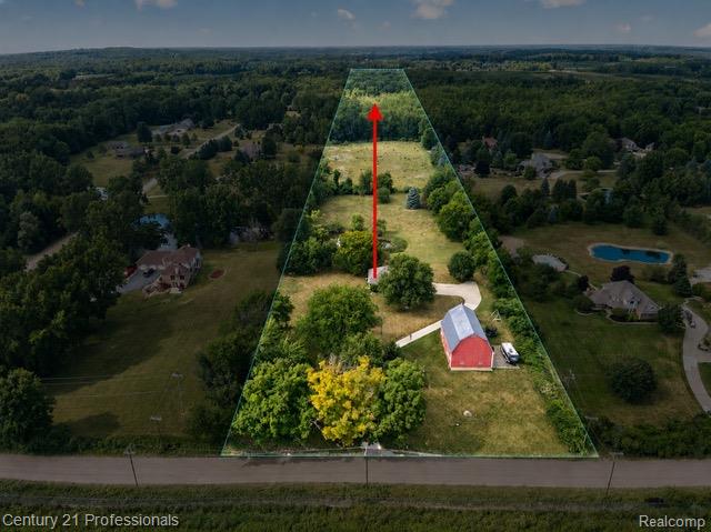 5675 36 Mile Road Romeo, MI 48065 - Photo 7 of 54 With 15 picturesque acres of rolling countryside, mature landscape, and a private pond, the property attracts abundant wildlife, making it an ideal retreat for the outdoor enthusiasts and those who enjoy HUNTING, subject to local regulations.