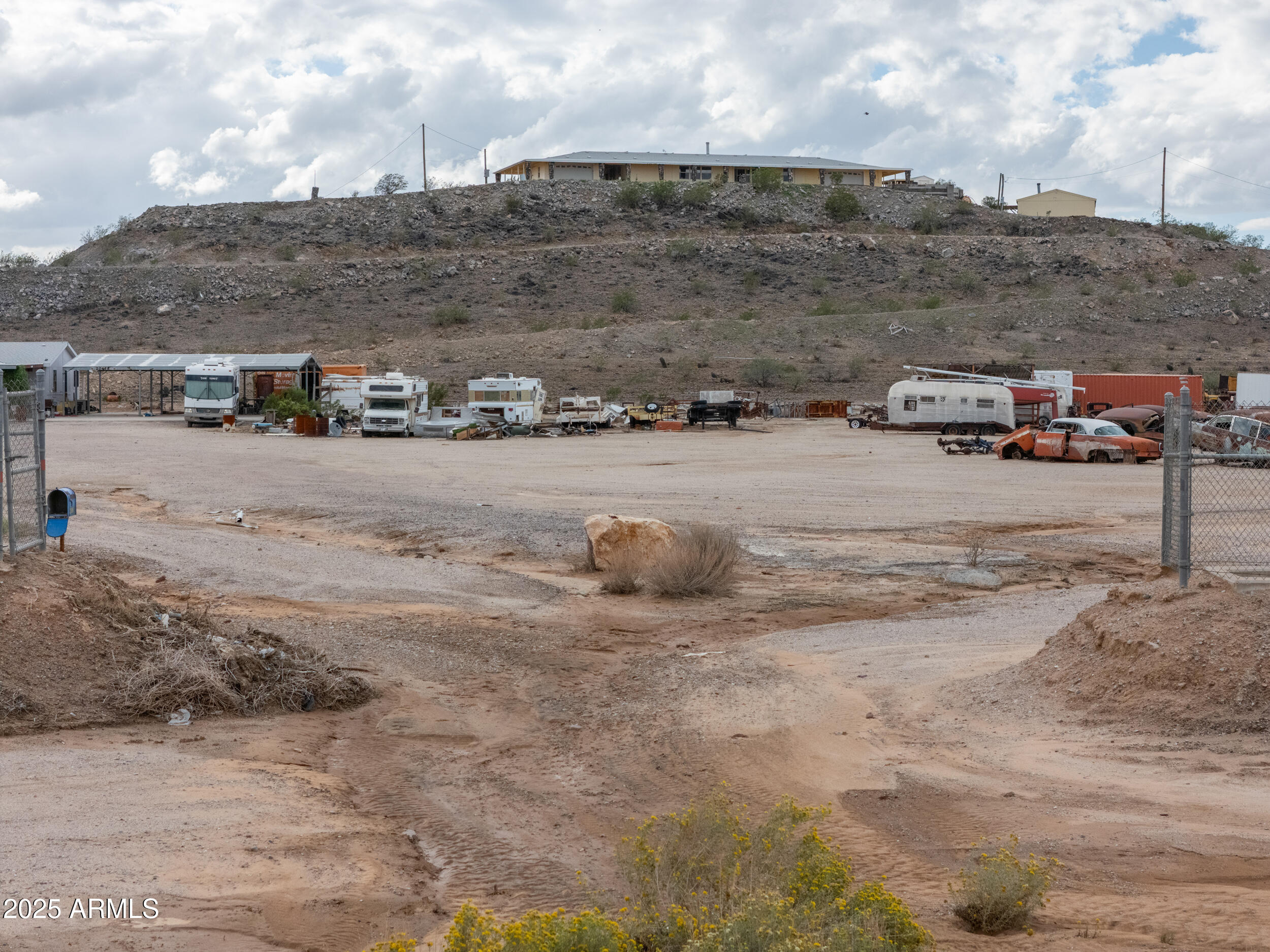 20678 North Warren Road Maricopa, AZ 85139 - Photo 20 of 31 a view of car parked on the beach