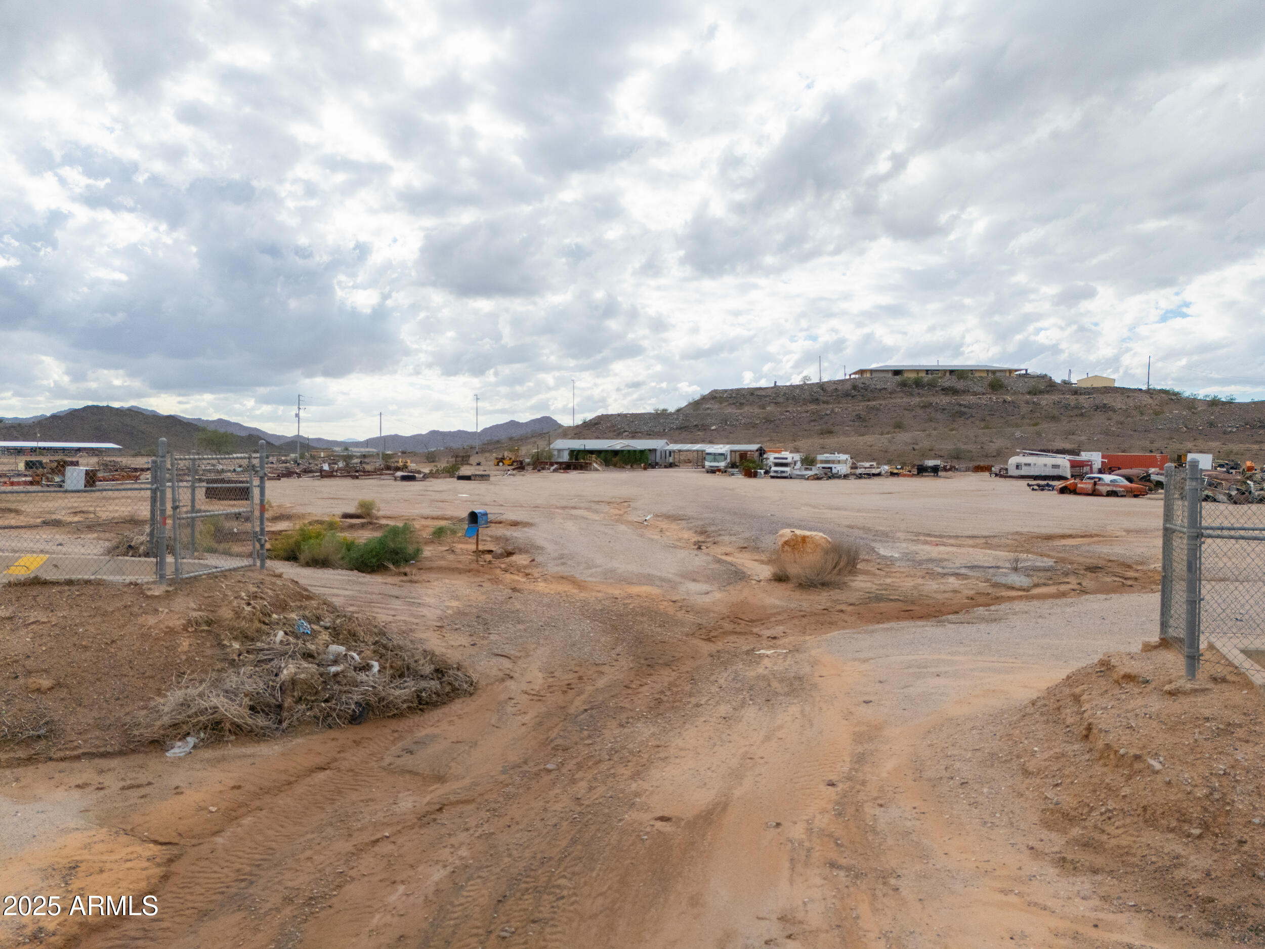 20678 North Warren Road Maricopa, AZ 85139 - Photo 21 of 31 a view of a road with an ocean view