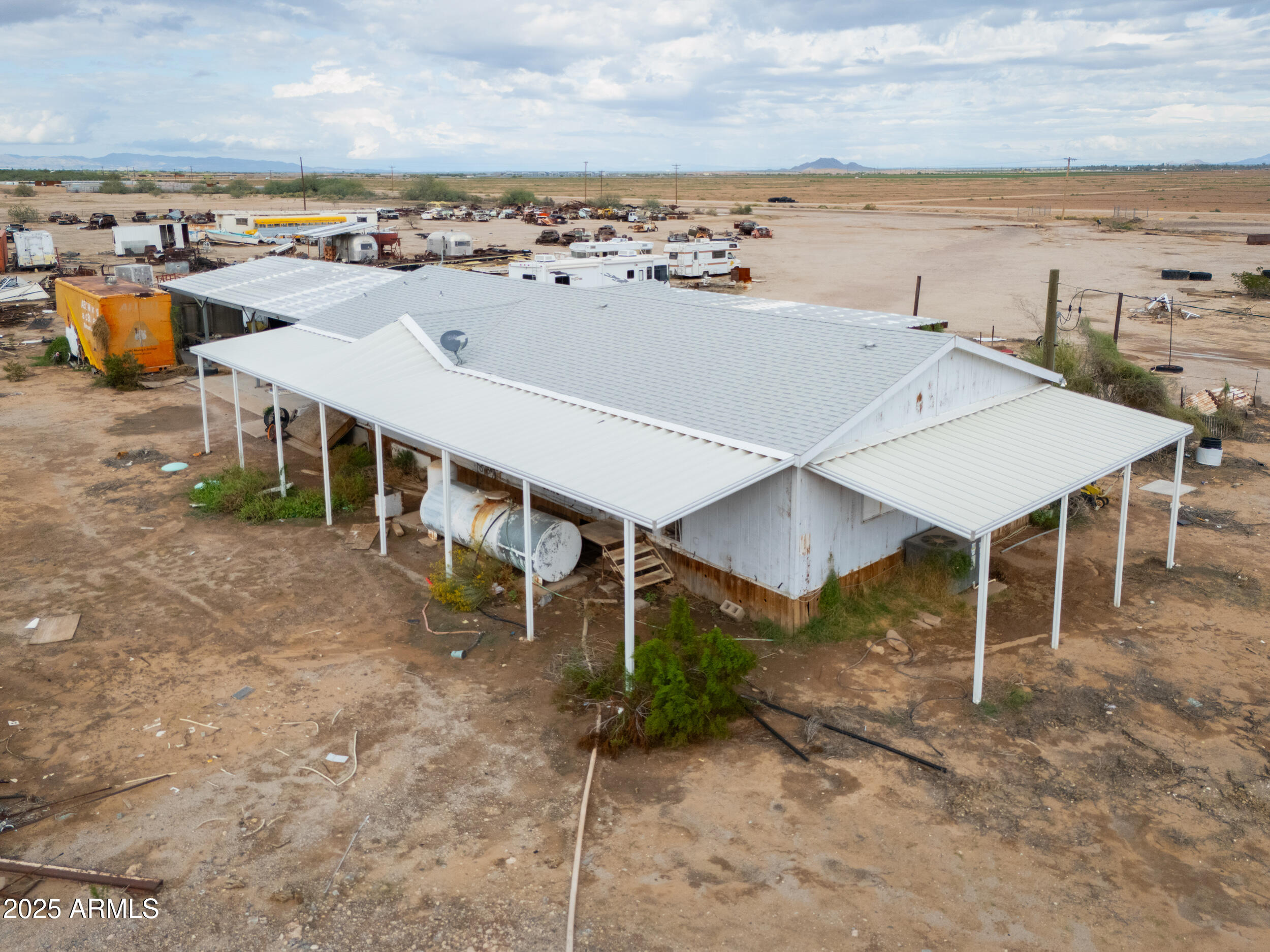 20678 North Warren Road Maricopa, AZ 85139 - Photo 28 of 31 a view of a terrace with an outdoor seating