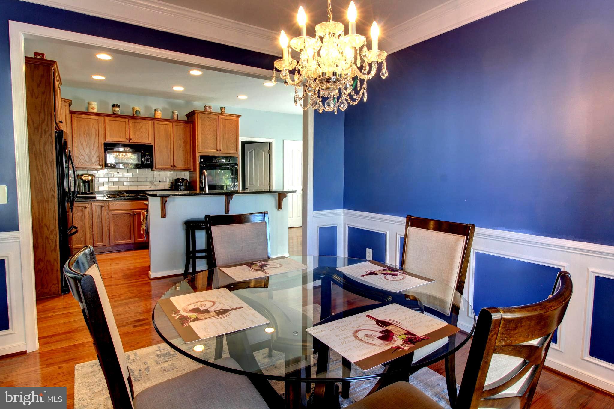 916 Augustine Drive Culpeper, VA 22701 - Photo 16 of 69 Formal dining room with elegant chandelier