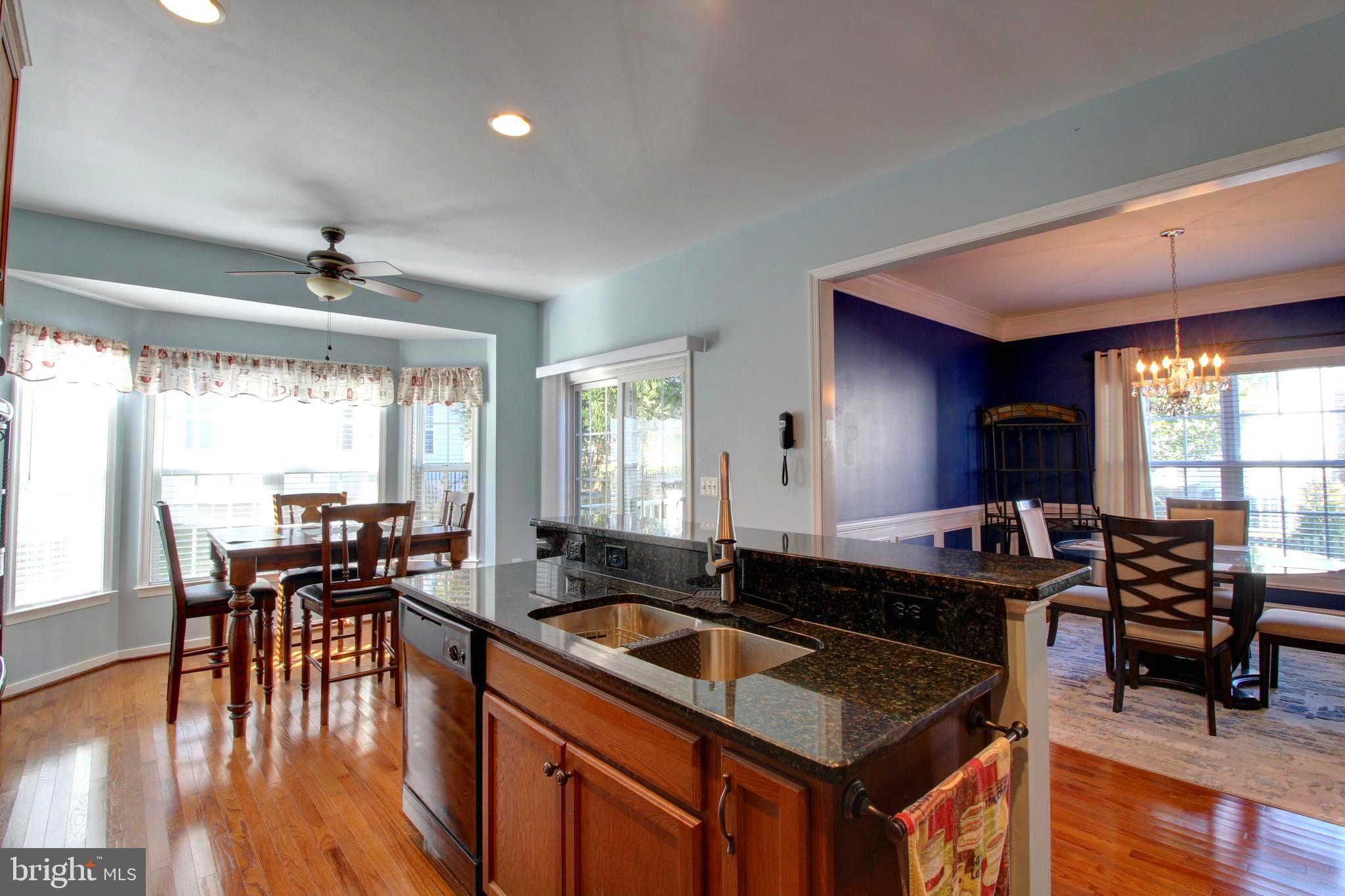 916 Augustine Drive Culpeper, VA 22701 - Photo 3 of 69 Breakfast area, raised bar and formal dining room