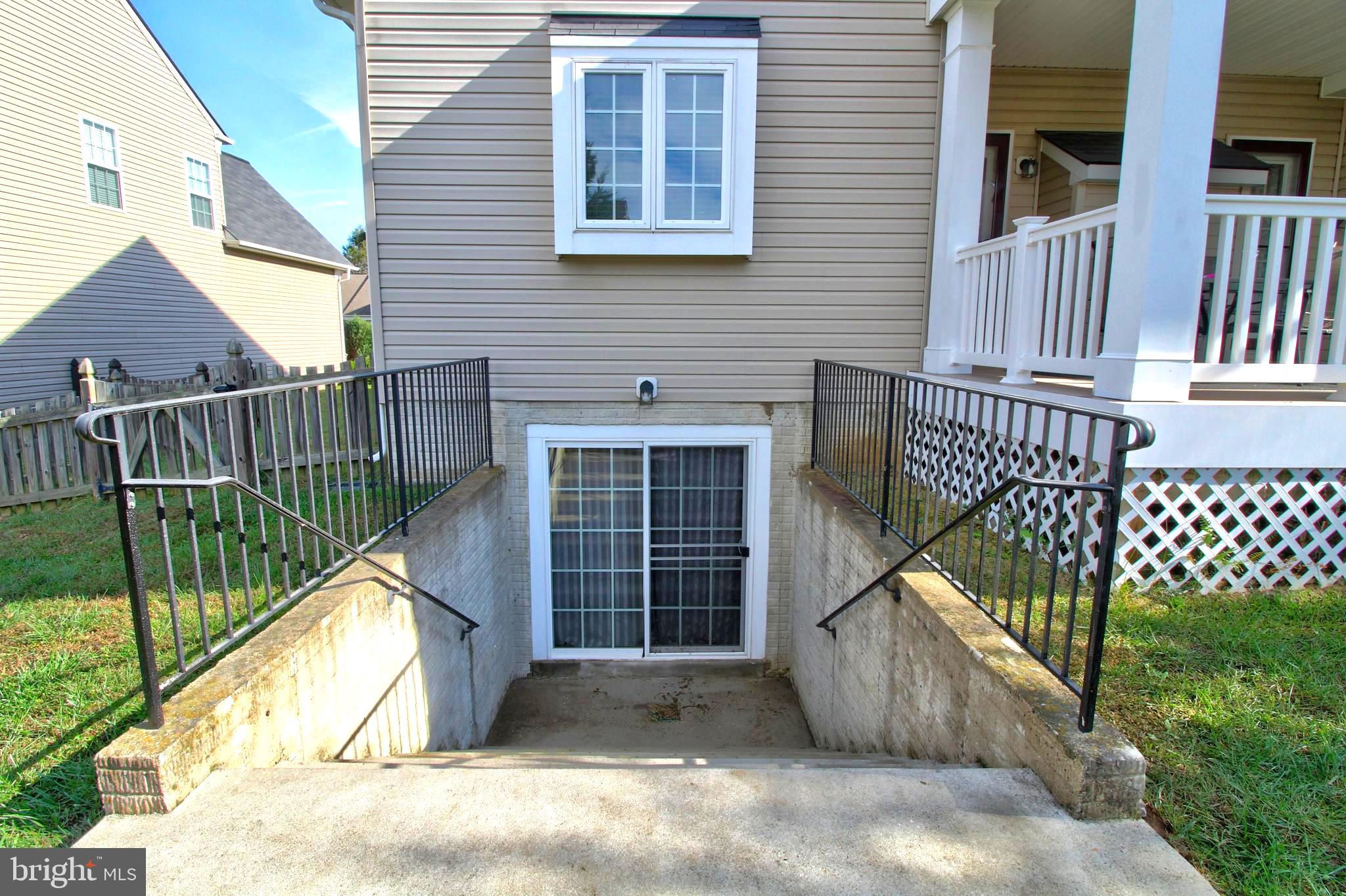 916 Augustine Drive Culpeper, VA 22701 - Photo 60 of 69 Stairs to backyard from basement