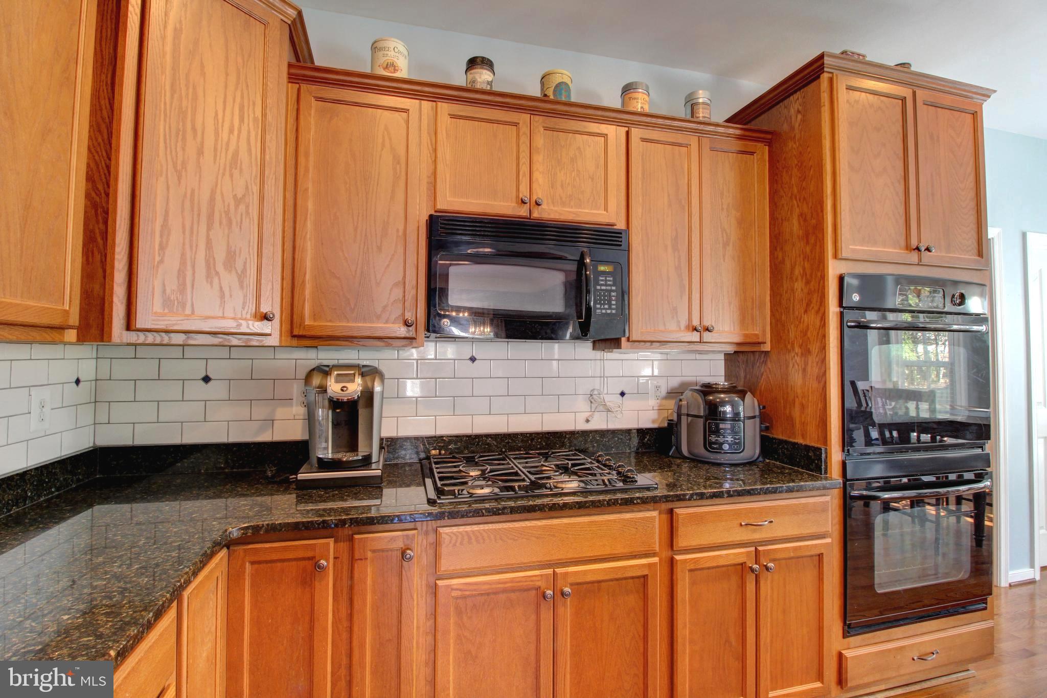 916 Augustine Drive Culpeper, VA 22701 - Photo 10 of 69 Gas cooktop, built-in microwave, double wall ovens