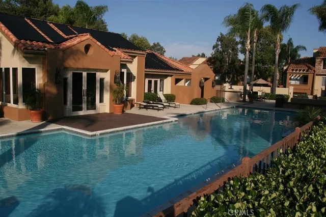 a view of a house with swimming pool