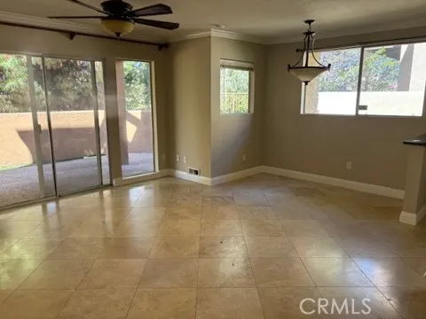 a view of an empty room and window