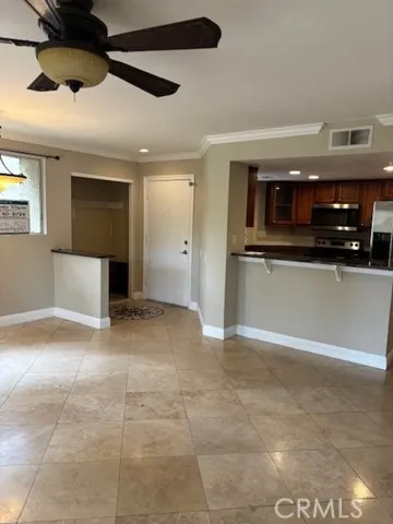 a kitchen with stainless steel appliances granite countertop a stove and a sink