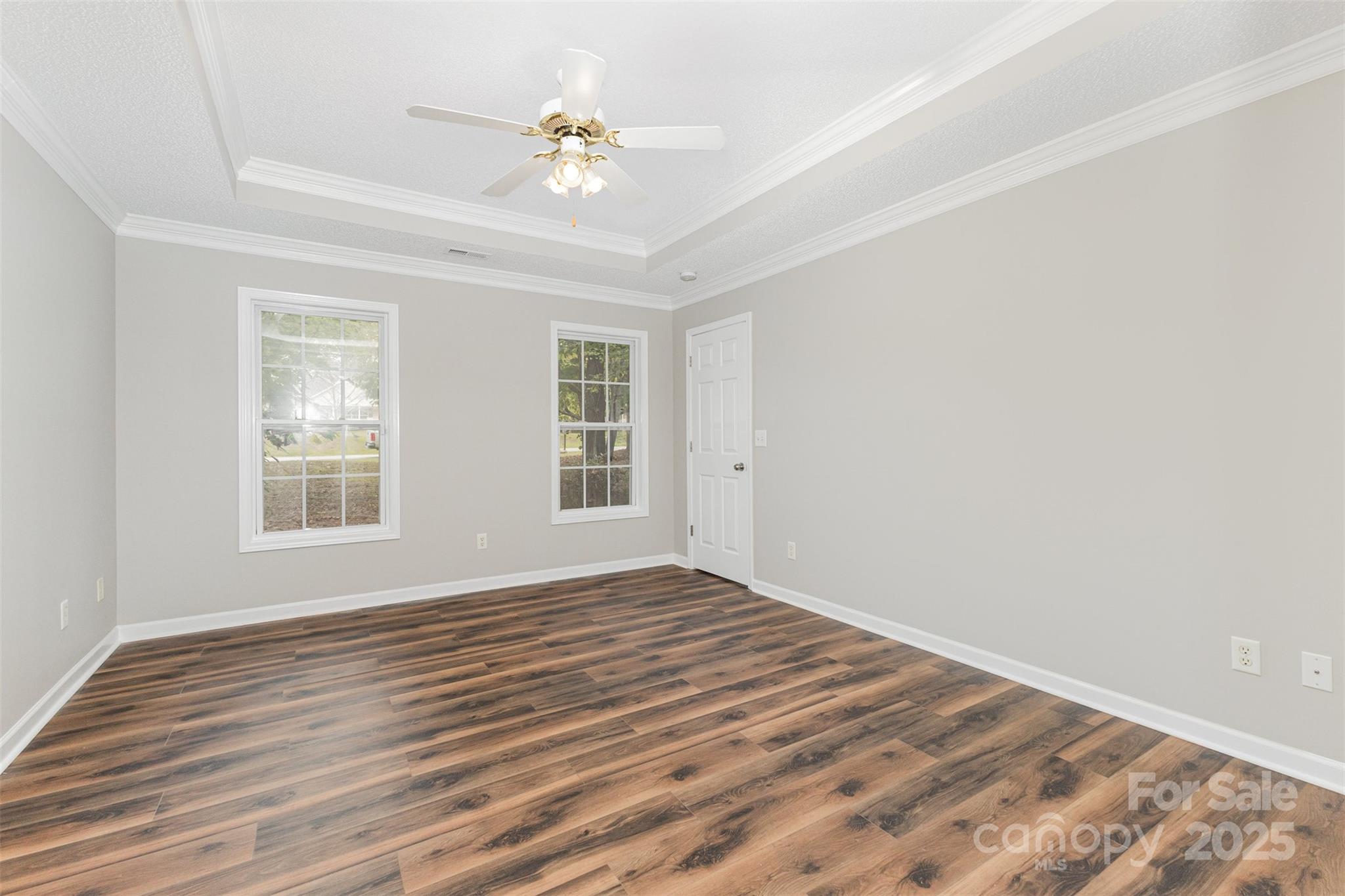 159 Scotch Pine Drive York, SC 29745 - Photo 11 of 28 wooden floor in an empty room with a window