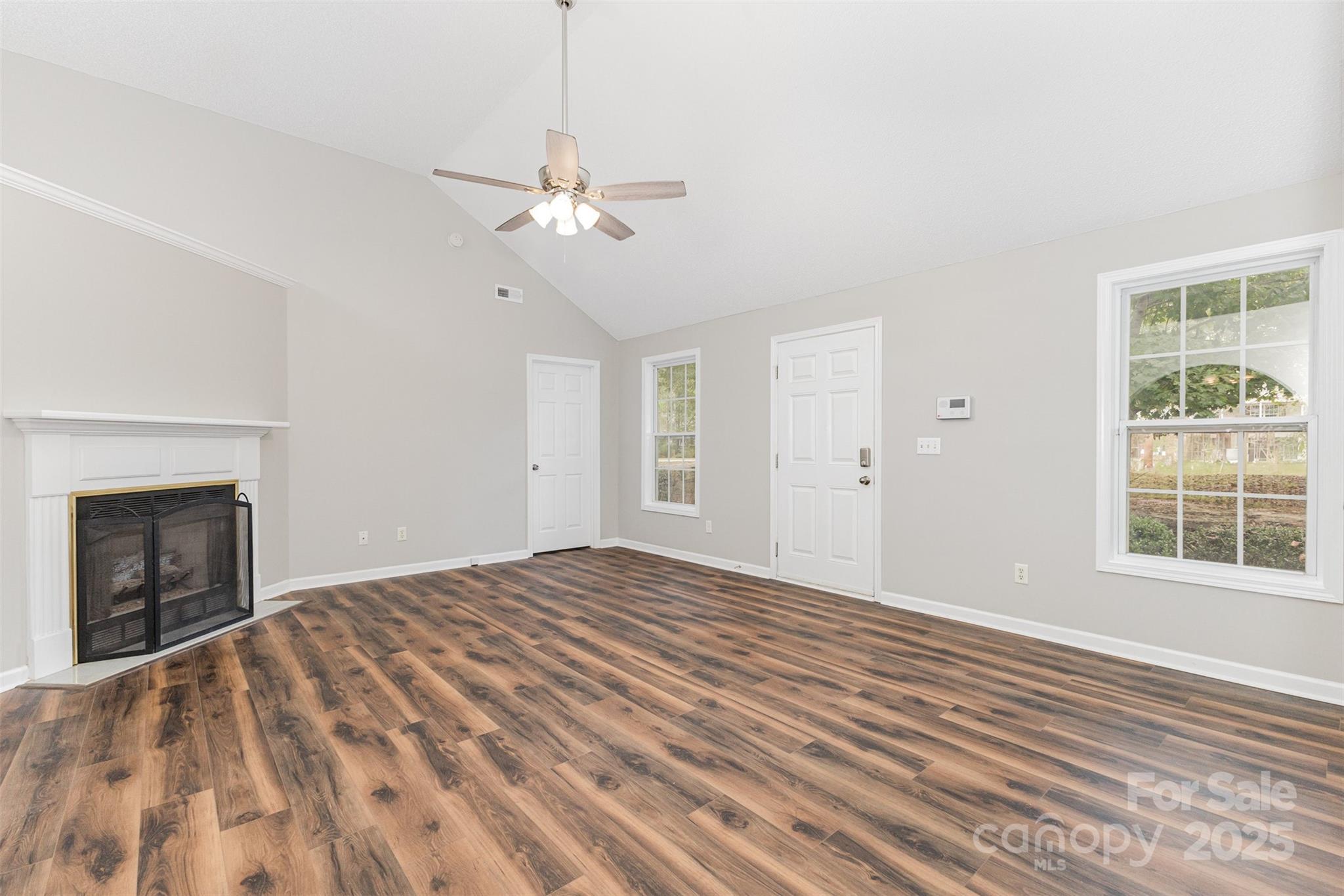 159 Scotch Pine Drive York, SC 29745 - Photo 3 of 28 a view of empty room with window and fireplace