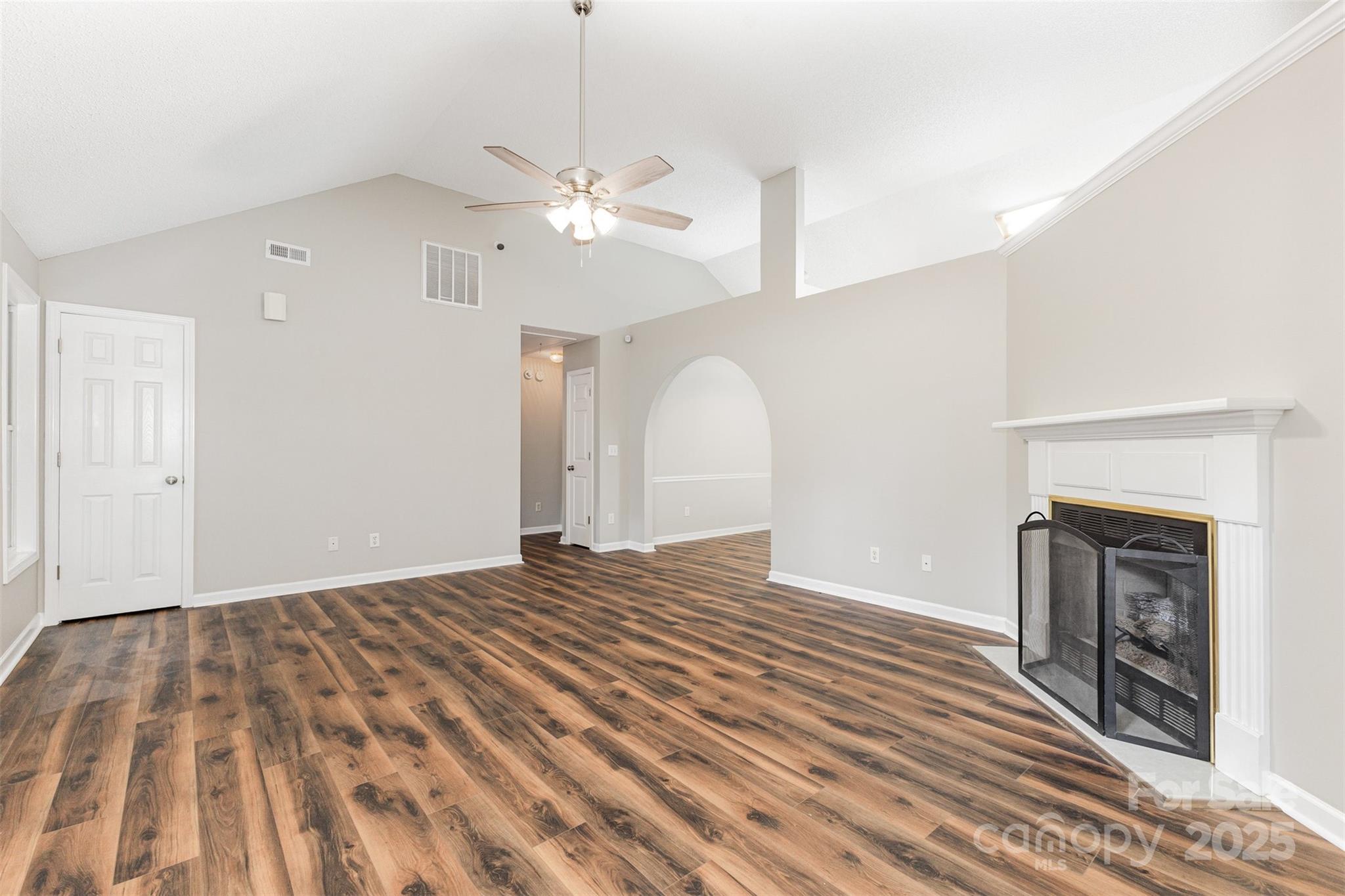 159 Scotch Pine Drive York, SC 29745 - Photo 4 of 28 a view of an empty room with a fireplace and a window
