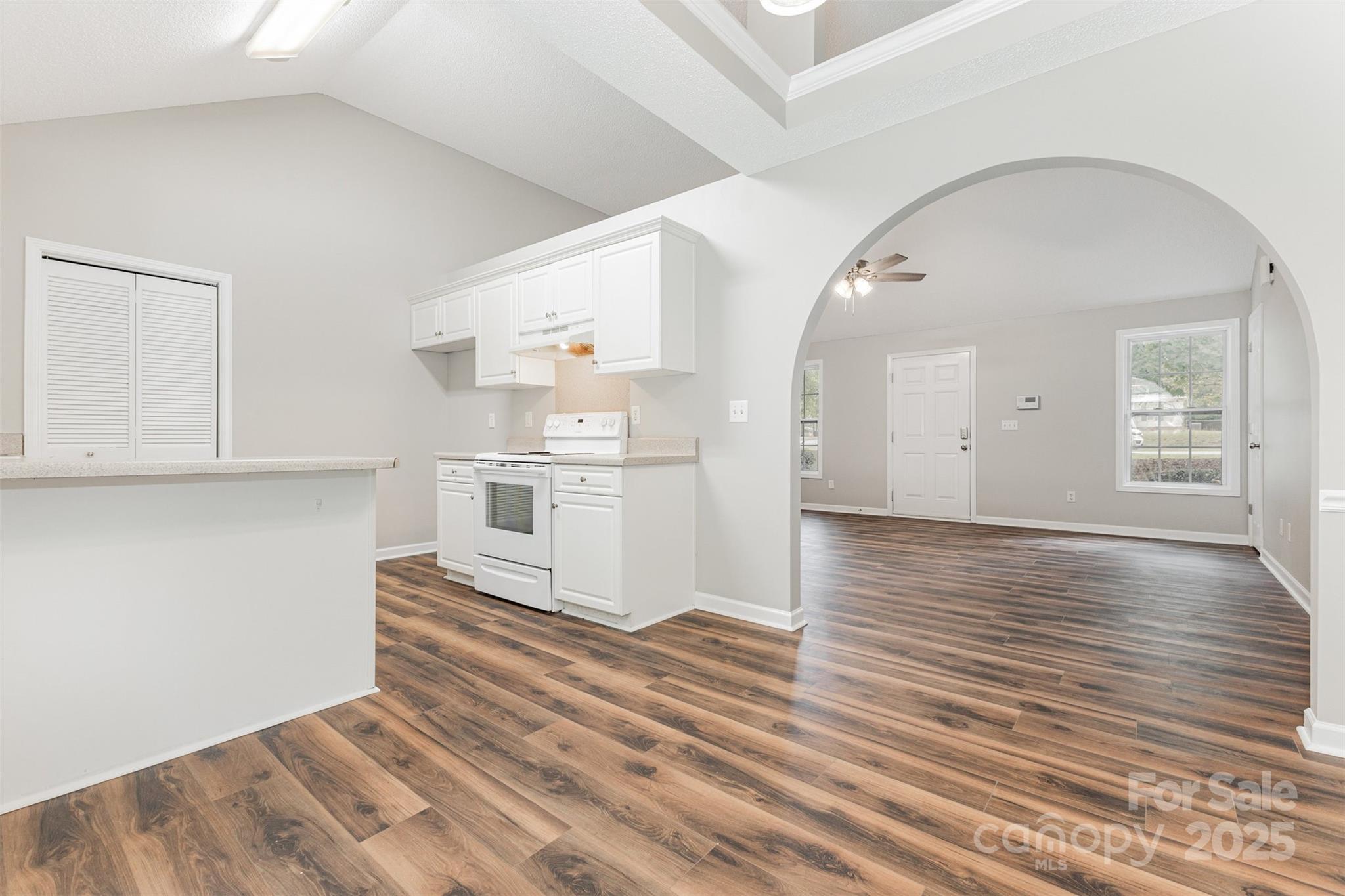 159 Scotch Pine Drive York, SC 29745 - Photo 5 of 28 an empty room with wooden floor and white walls