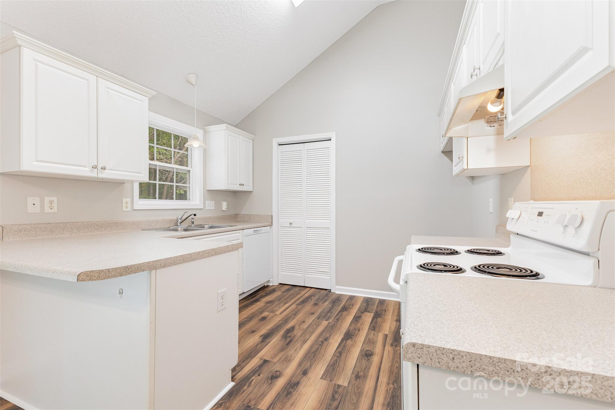 159 Scotch Pine Drive York, SC 29745 - Photo 8 of 28 a kitchen with stainless steel appliances a stove a sink and a refrigerator