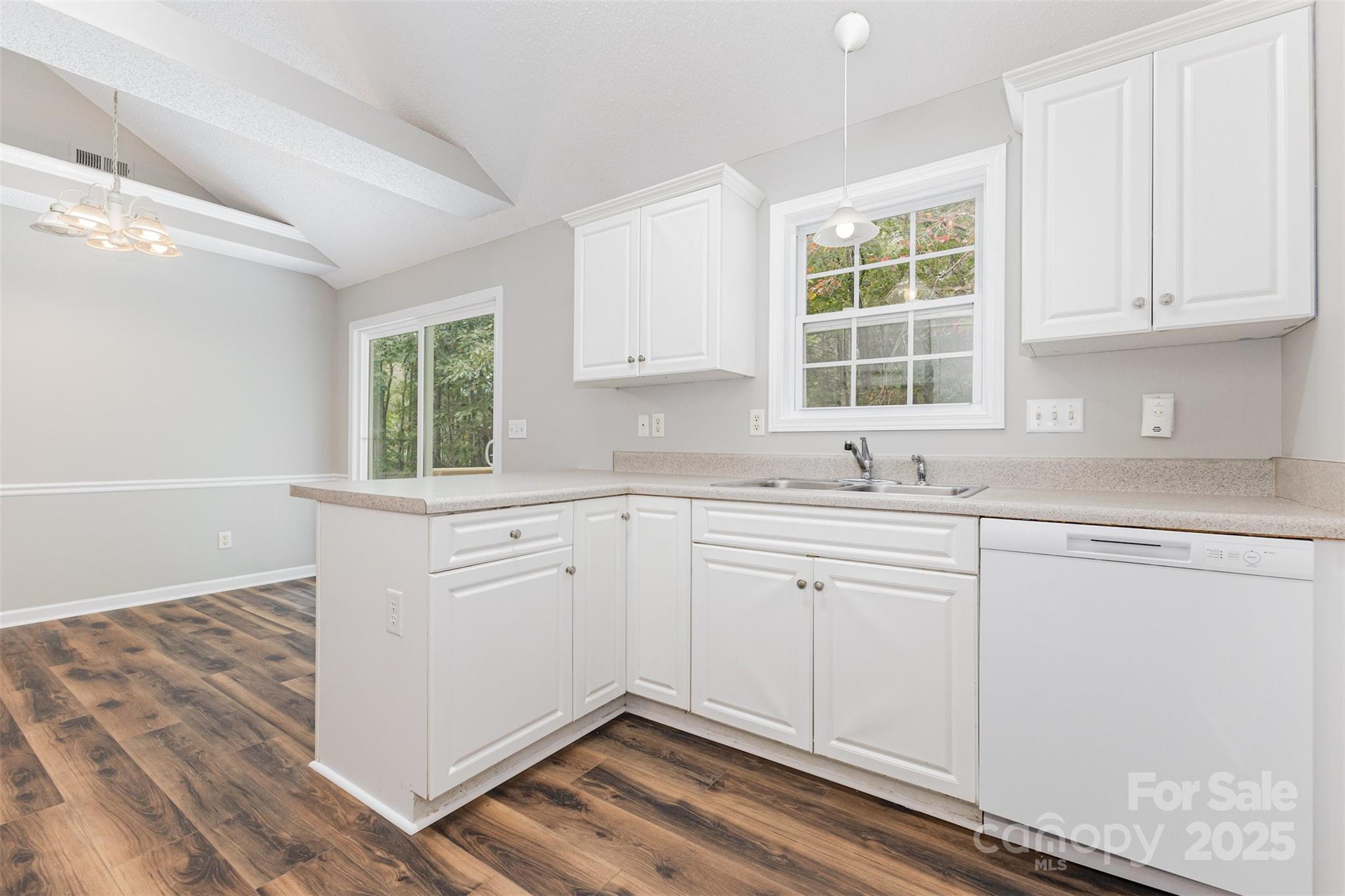 159 Scotch Pine Drive York, SC 29745 - Photo 10 of 28 a kitchen with granite countertop white cabinets and white appliances
