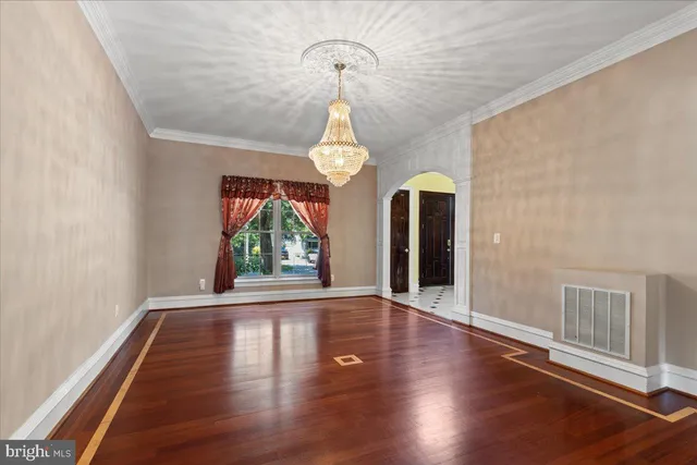 a living room with granite countertop furniture and floor to ceiling window