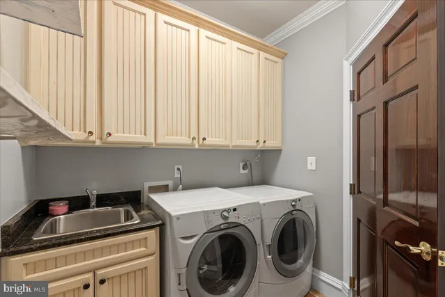 a picture of a wall with a white building