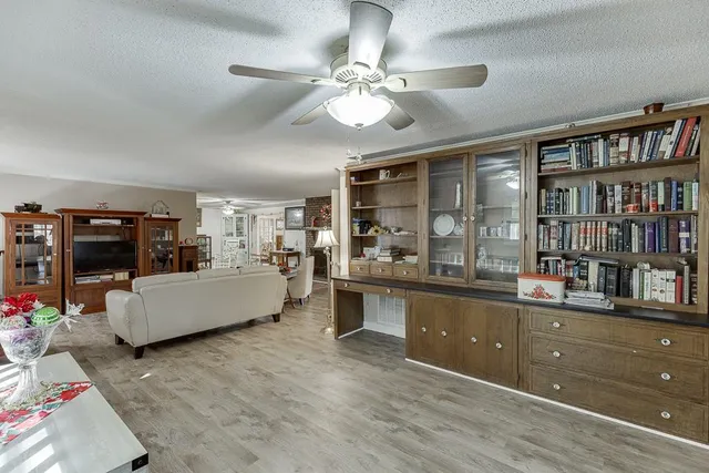 a kitchen with a stove a sink and a refrigerator