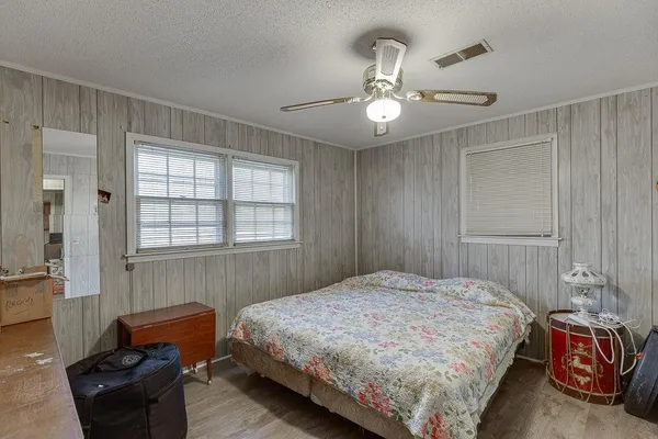 a room with gym equipment and a table