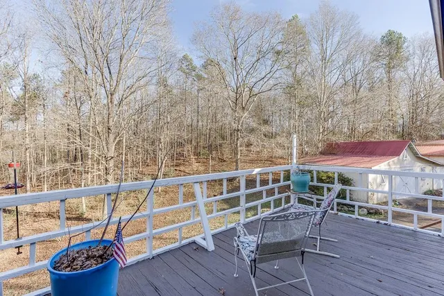 a house with trees in the background