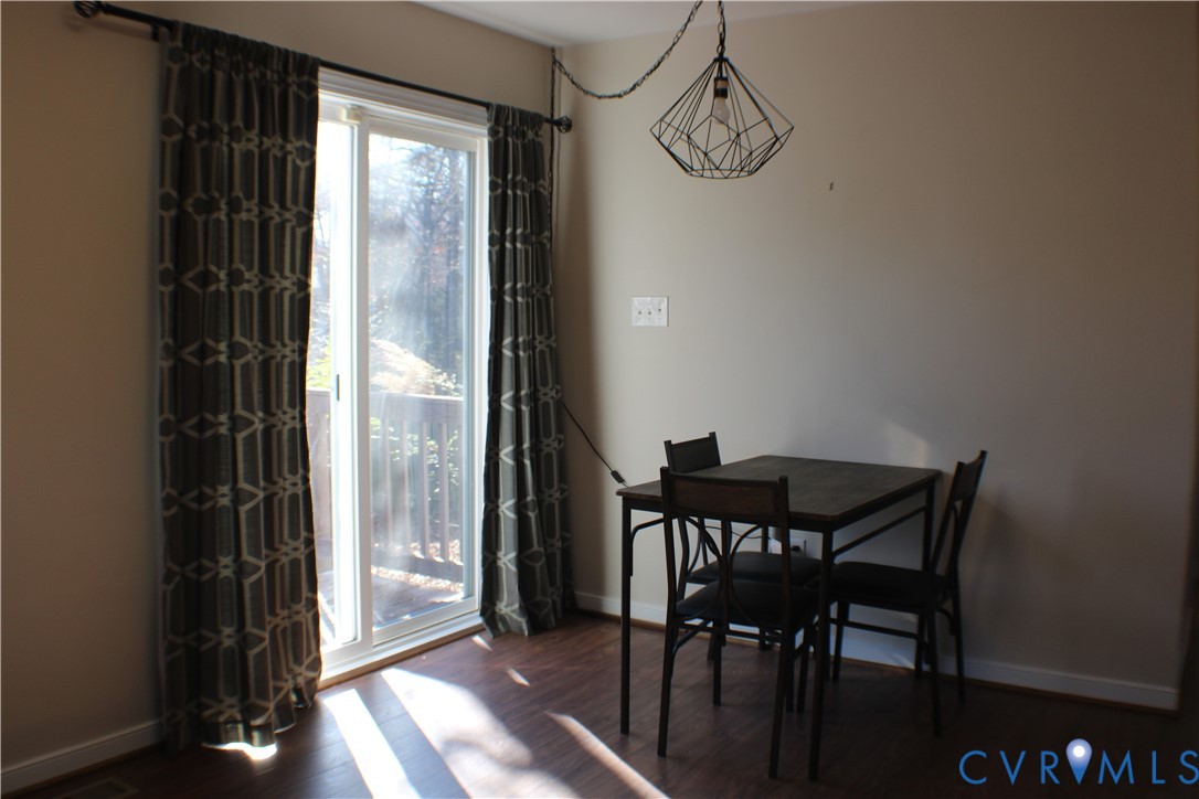 2929 South Ridge Drive Midlothian, VA 23112 - Photo 16 of 37 a view of a dining room with furniture and a window