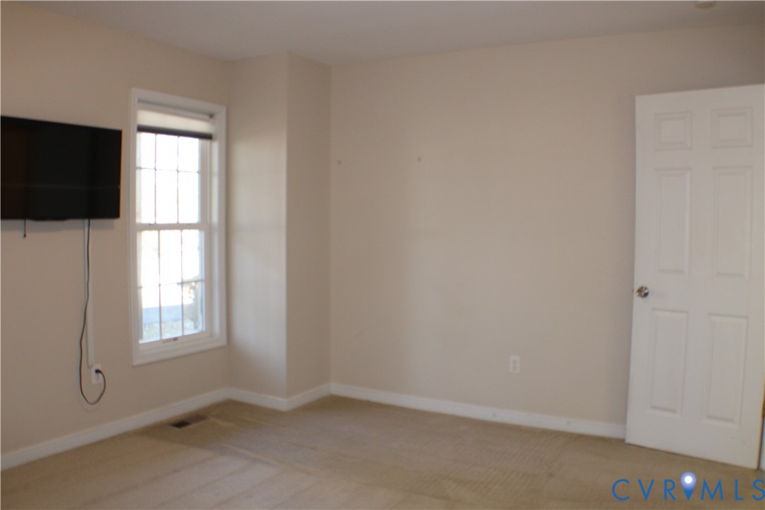 2929 South Ridge Drive Midlothian, VA 23112 - Photo 19 of 37 a view of an empty room with a window