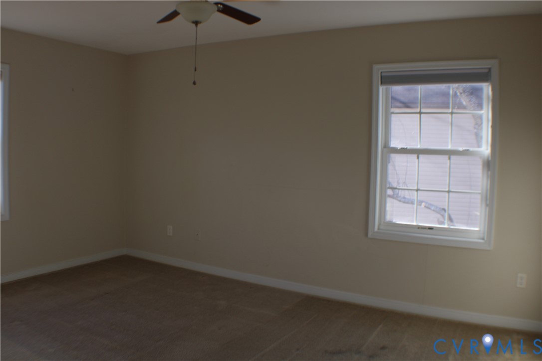 2929 South Ridge Drive Midlothian, VA 23112 - Photo 24 of 37 an empty room with a window