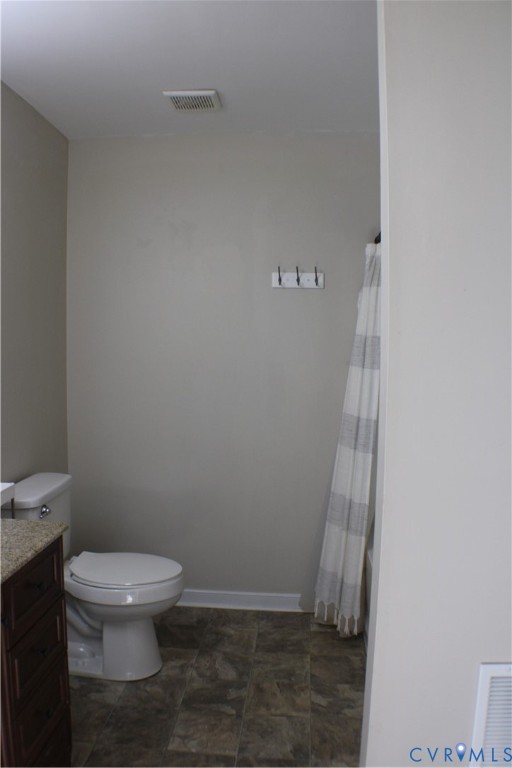 2929 South Ridge Drive Midlothian, VA 23112 - Photo 28 of 37 a bathroom with a toilet and a shower
