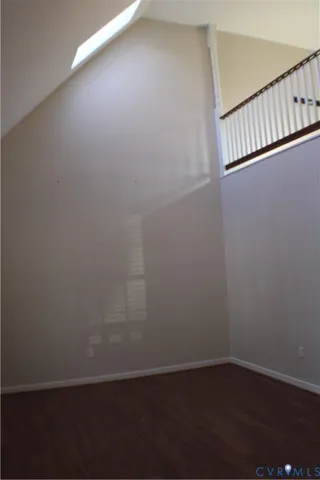 a kitchen with granite countertop cabinets stainless steel appliances and a sink
